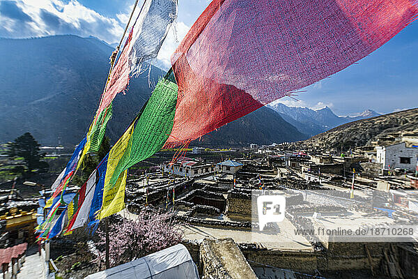 Historical village of Marpha and prayer flags  Jomsom  Himalayas  Nepal  Asia