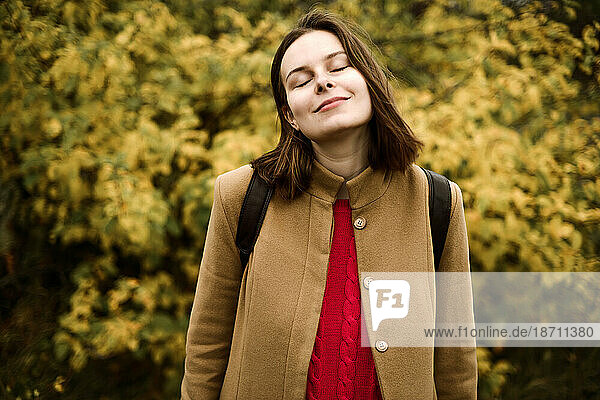 Young Woman In Autumn Park