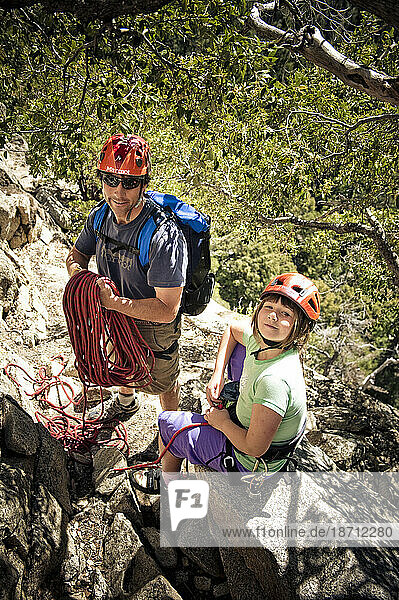 A father and daughter prepare to climb in Yosemite Valley.