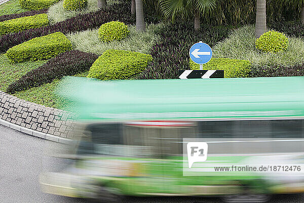 A bus going round a roundabout in Hong Kong  China.