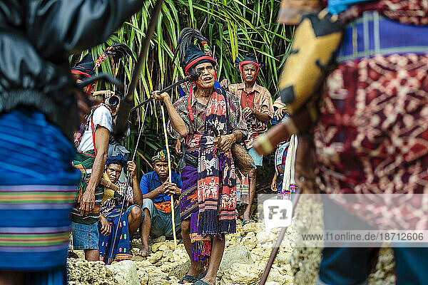 Man participating in ceremony before Pasola festival  Sumba Island  Indonesia