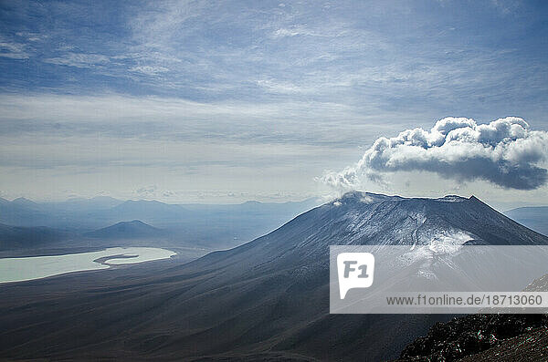 Scenic view of the Juriques Volcano against cloudy sky in Bolivia