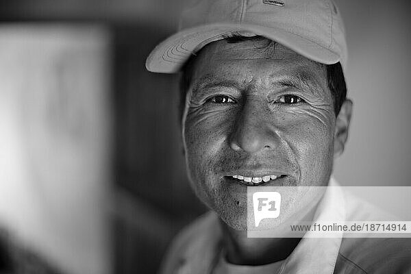 portrait (headshot) of a man with a cap in huaraz  Peru. (black and white)