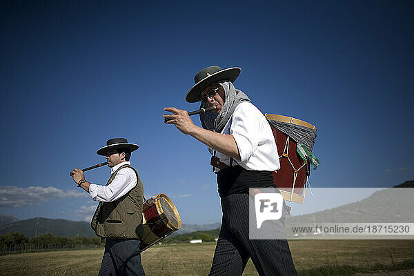 Men play a drum and flute during a pilgrimage in Prado del Rey village  Cadiz Province  Andalusia  Spain.