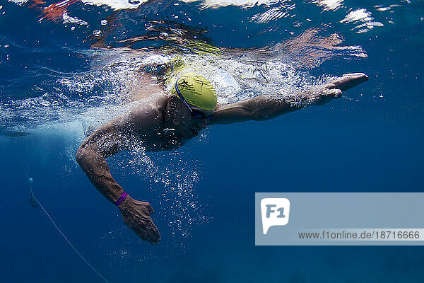 A swimmer competes in the Mana Island Ocean Swim off the Mana Island coast in Fiji.