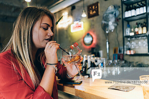 Blonde Girl In A Cocktail Bar.