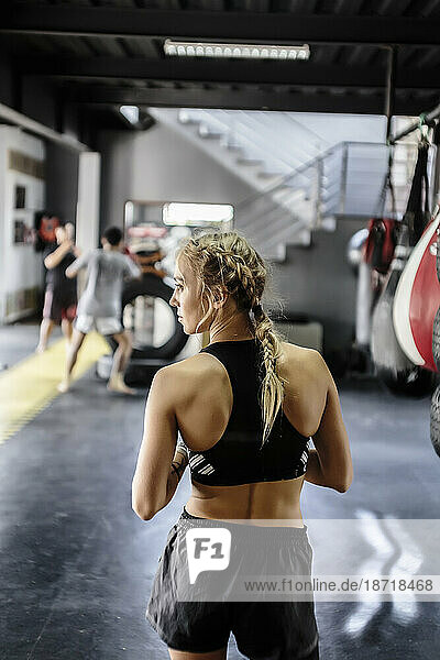 Rear view of young woman in kickboxing gym  Seminyak  Bali  Indonesia