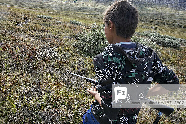 A boy  13  hunting a caribou at a summer camp for foster children near Nuuk  Greenland.