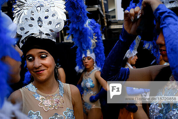 Costumed carnival dancers wait backstage in Merida  Venezuela.