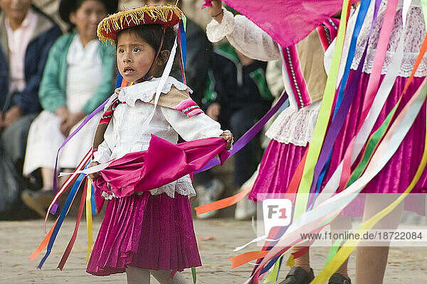 A young girl performs in a dance competition in Llamay  near Cusco  Peru during the Santa Rosa de Lima festival.