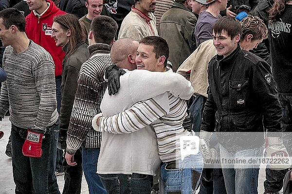 Fighters Embracing Each Other At The Festival Of Maslenitsa