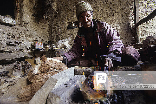 A tinsmith practicing his craft in Zanskar  a tiny kingdom located in Ladakh  India.