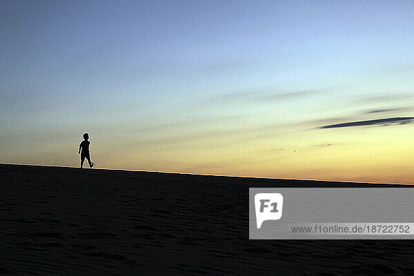 A child plays on the beach  at Outer Banks  North Carolina