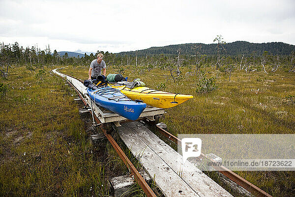 Preparing to kayak Oliver Inlet Portage Admiralty Island  Alaska
