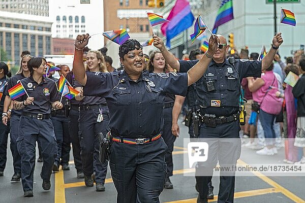 Detroit  Michigan USA  11 June 2023  Gay  lesbian  bisexual  and transgender activists and their allies march for equality in the Motor City Pride parade. Members of the Detroit Police Department joined the parade