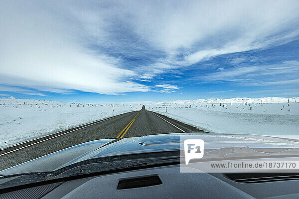 USA  Idaho  Sun Valley  Highway through snow-covered landscape as seen from car
