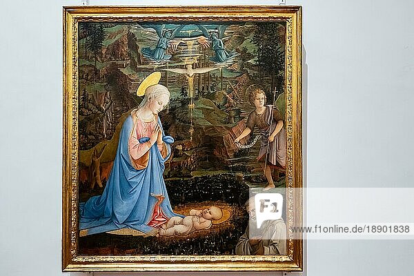 FLORENZ  TOSKANA/ITALIEN - 19. OKTOBER : Gemälde der Anbetung des Christuskindes mit dem jungen Johannes dem Täufer in den Uffizien in Florenz am 19. Oktober 2019
