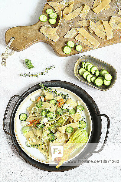 Pappardelle with courgette flowers  zucchini and feta cheese