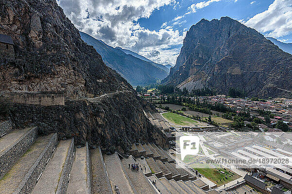 Ollantaytambo  Inca historic terraces and buildings  and view of the town from above in the Andes.