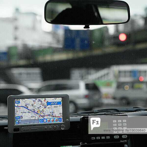 Interior of taxi with electronic navigation device  Tokyo  Japan.