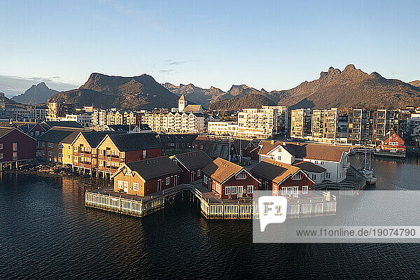 Fishing village and town of Svolvaer at sunrise in autumn,  aerial view,  Lofoten Islands,  Nordland,  Norway,  Scandinavia,  Europe