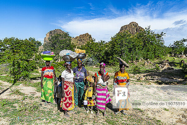 Kapsiki women coming back from the fields  Rhumsiki  Mandara mountains  Far North province  Cameroon  Africa