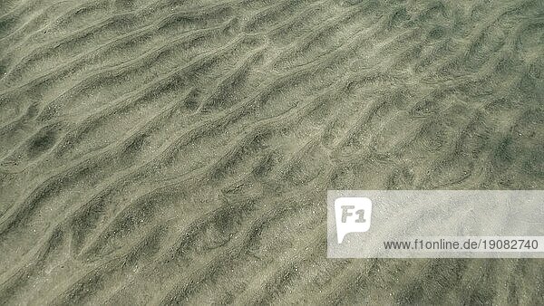 Sandboden bedeckt mit Sandhügeln  Natürlicher Hintergrund aus der Unterwassertiefe  Rotes Meer  Ägypten  Afrika