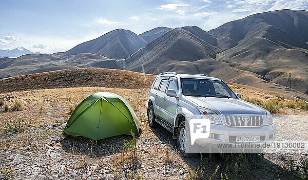 Toyota Landcruiser and tent on a hill  Chuy province  Kyrgyzstan  Asia
