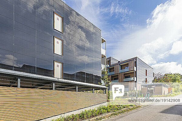Germany  Baden-Wurttemberg  Stuttgart  Solar panels on side of modern suburban apartment buildings