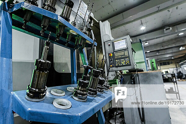 Drills on cnc machinery in metal factory