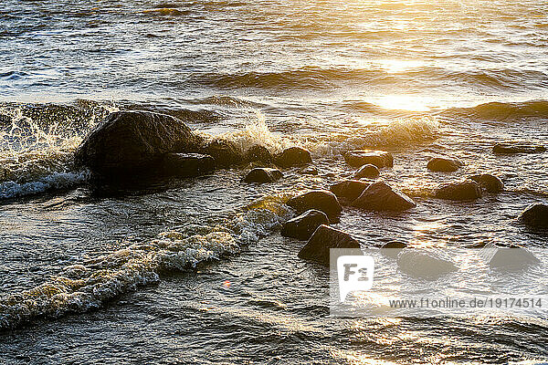 Germany  Mecklenburg-Vorpommern  Coastal rocks at sunset