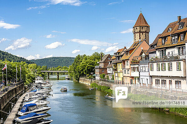 Germany  Baden-Wurttemberg  Wertheim am Main  Moored boats and historic houses along river Main