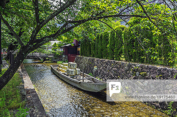 Japan  Kyoto Prefecture  Kyoto City  Rowboat in Kamo river in summer