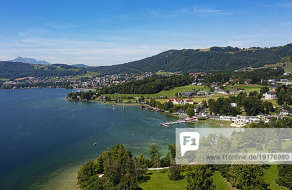 Austria  Upper Austria  Altmunster  Drone panorama of town on shore of Traunsee lake in summer