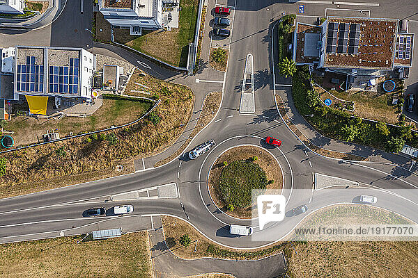 Germany  Baden-Wurttemberg  Plochingen  Aerial view of traffic circle with suburban houses in background