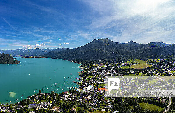 Austria  Upper Austria  Sankt Gilgen  Drone view of Lake Wolfgangsee and surrounding town in summer