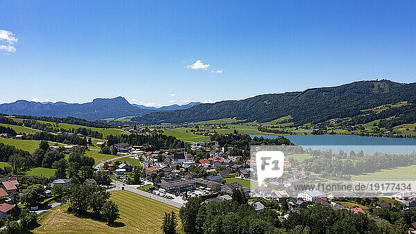 Austria  Upper Austria  Zell am Moos  Drone panorama of village on shore of Irrsee lake in summer