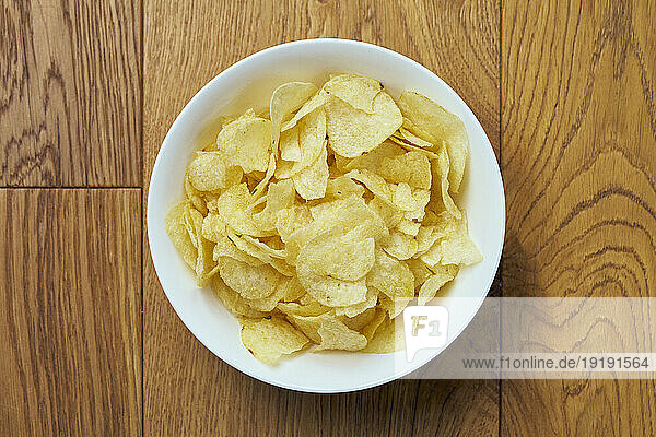 View from above still life bowl of potato chips