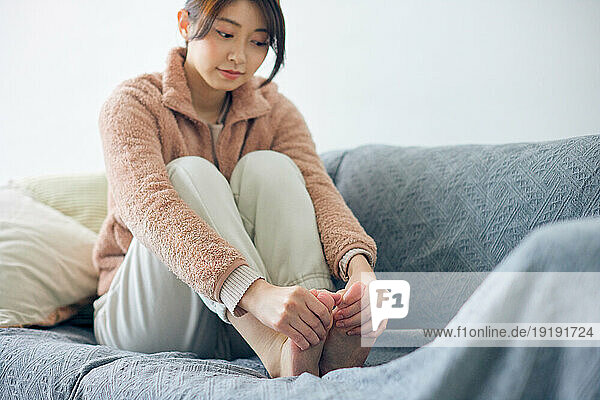 Japanese woman relaxing at home