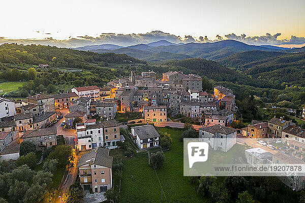 Italy  Tuscany  Torniella  Aerial view of mountain village at dusk