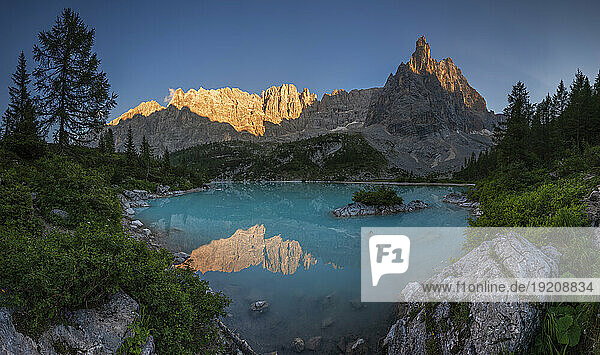 Italy  Veneto  Lake Sorapiss and Dito di Dio peak at springtime dusk