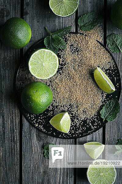 Lime  mint and cane sugar on a tray