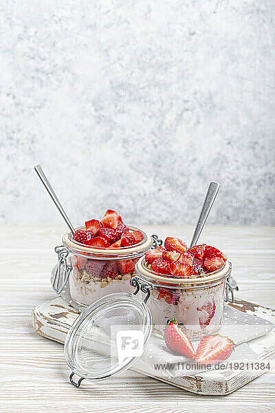Parfait with fresh strawberries,  yogurt and crunchy granola