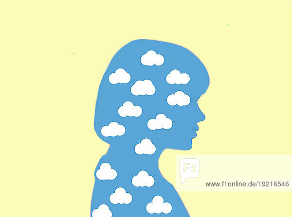 Silhouette of woman filled with white clouds