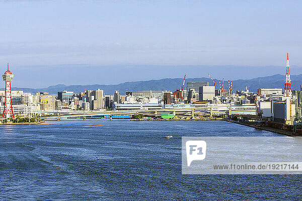 Japan  Fukuoka Prefecture  Fukuoka City  City harbor area with bridge in background