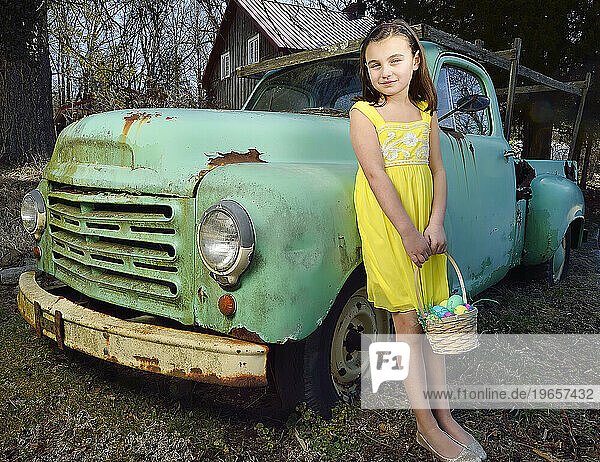 Young Girl by Old Truck