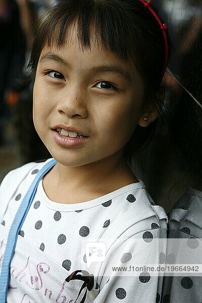 Portrait of a young girl at Liberdade  the Japanese quarter  Sao Paulo  Brazil.