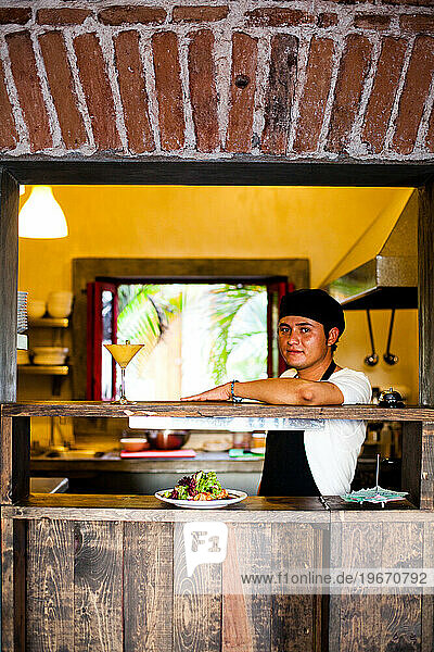A portrait of a chef in the kitchen in a restaurant in Todos Santos  Mexico.