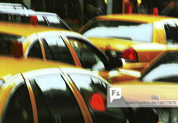 Taxis moving on the road  New York  USA. (motion blur)