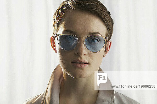 Young Woman Wearing Blue Tinted Sunglasses